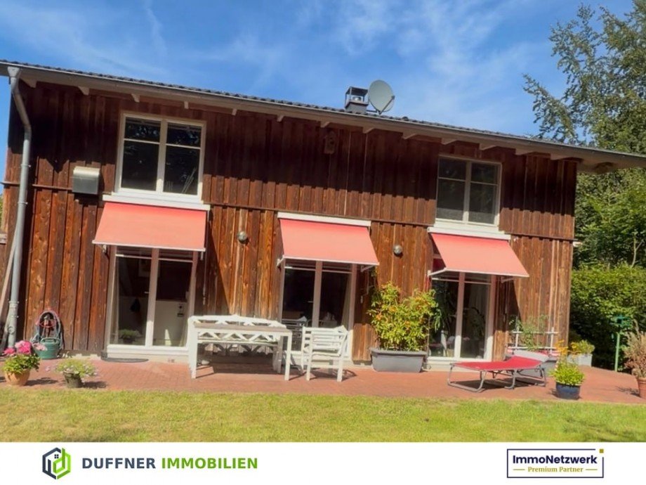 Gartenansicht Einfamilienhaus Rosengarten